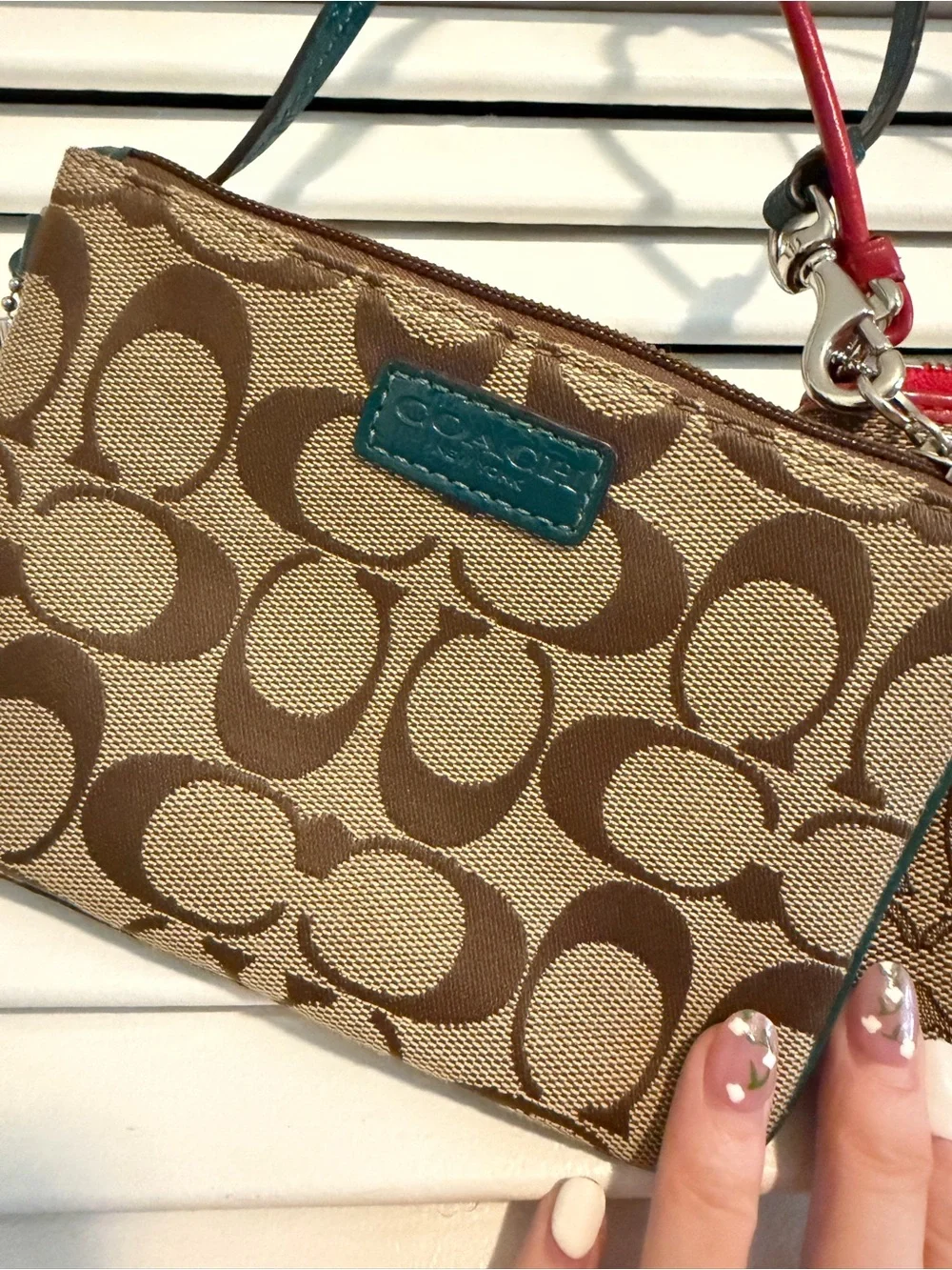 Coach two wristlets